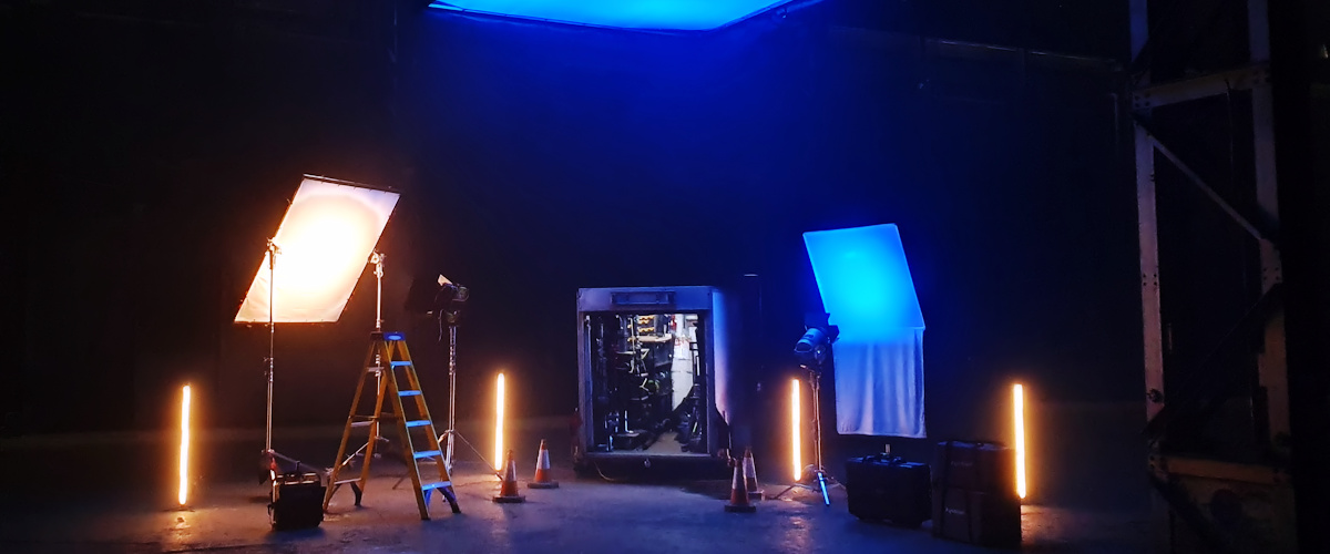 Glasgow Gaffer and Film Lighting Hire showing lighting trailer surrounded by lighting equipment